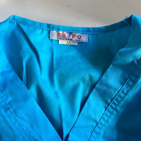 Expo Uniform M blue scrubs NWOT. 39” long legs 44” pit to pit around - Picture 4 of 9